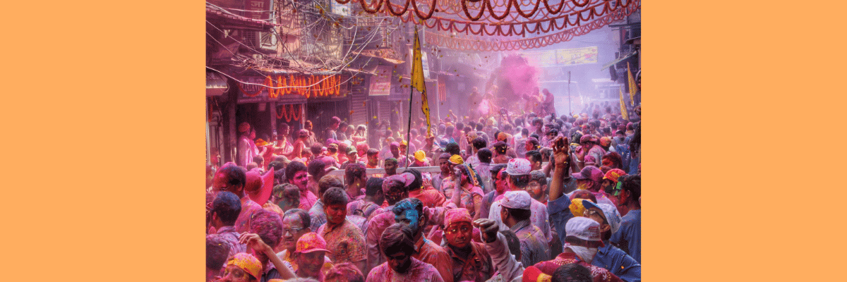hundreds of people celebrating Holi Festival in India